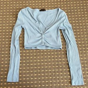 Out from sunder long sleeve crop top